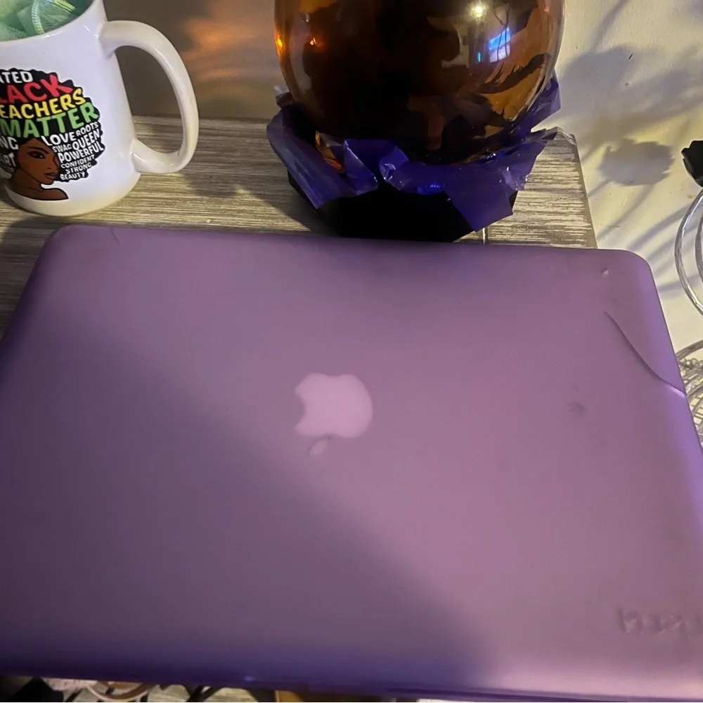 Apple MacBook with Silver Body and Black Keyboard